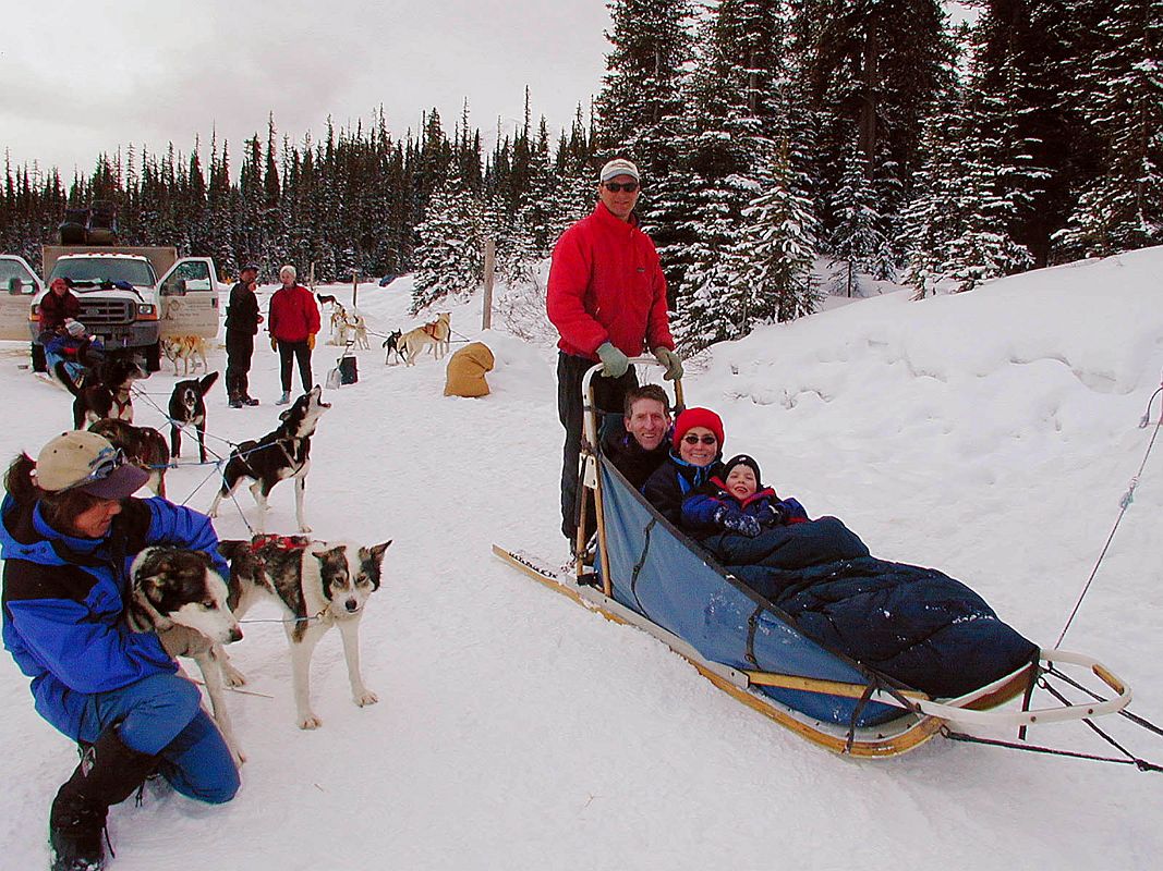 03 Jerome Ryan, Charlotte Ryan and Peter Ryan Taking A Dogsled Tour n The Winter Next To The Road Between Lake Louise Village And Lake Louise In Winter